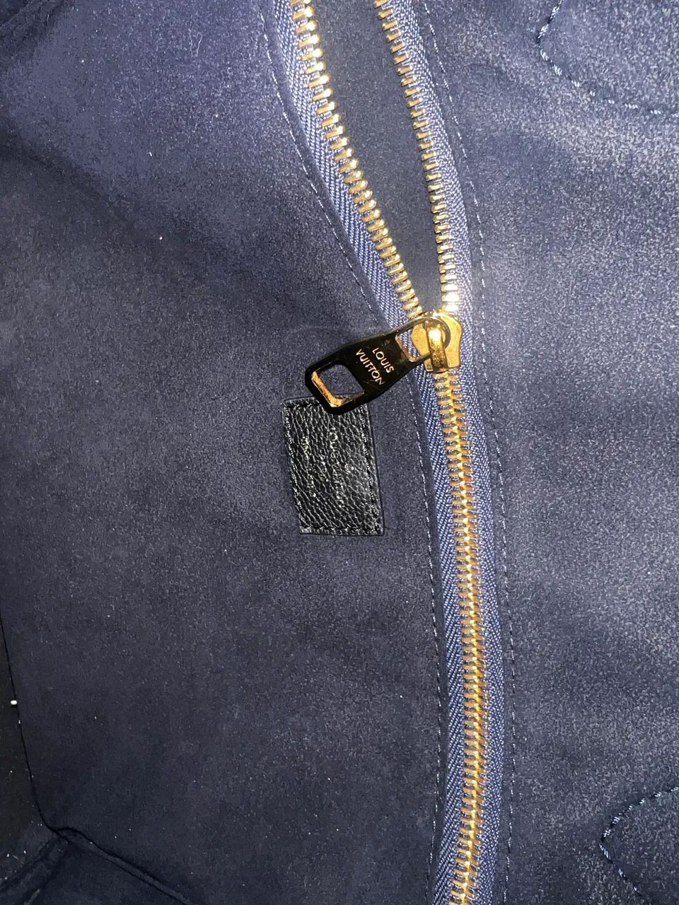 Bolsa Louis Vuitton Neverfull MM em couro Monogram Empreinte, preta (Noir) - Foto 2