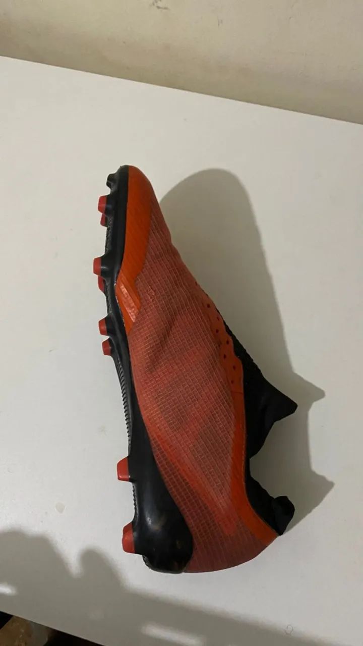 chuteira umbro