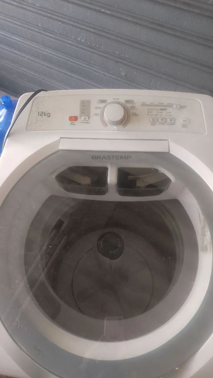 Máquina de lavar com defeito 