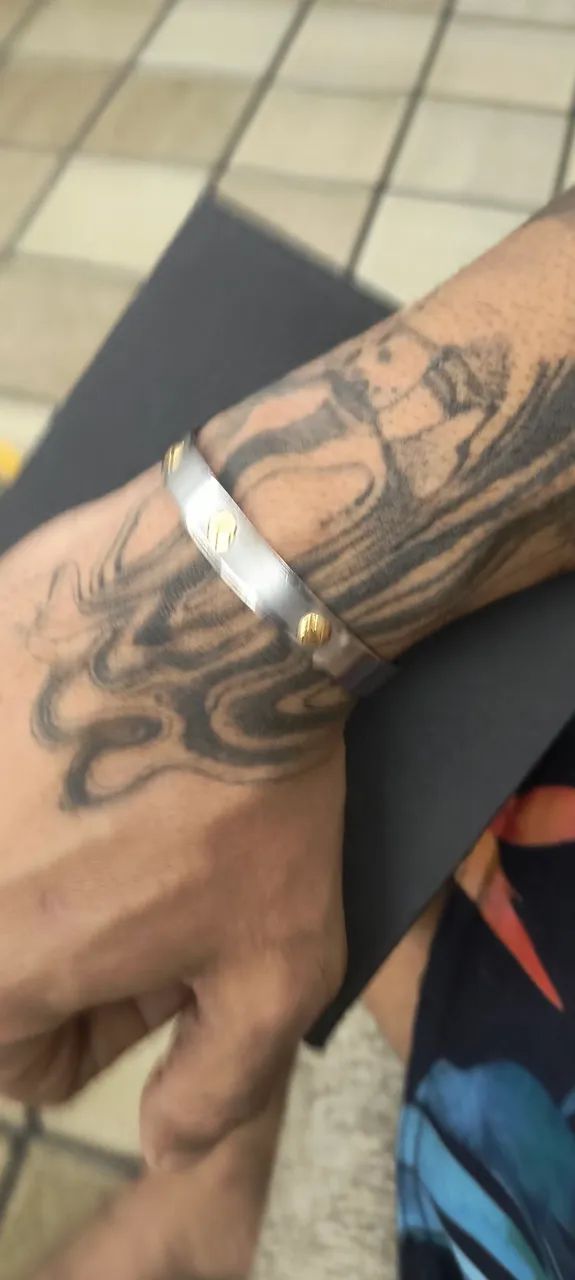 Bracelete em aço com detalhes em ouro 18k - Foto 3