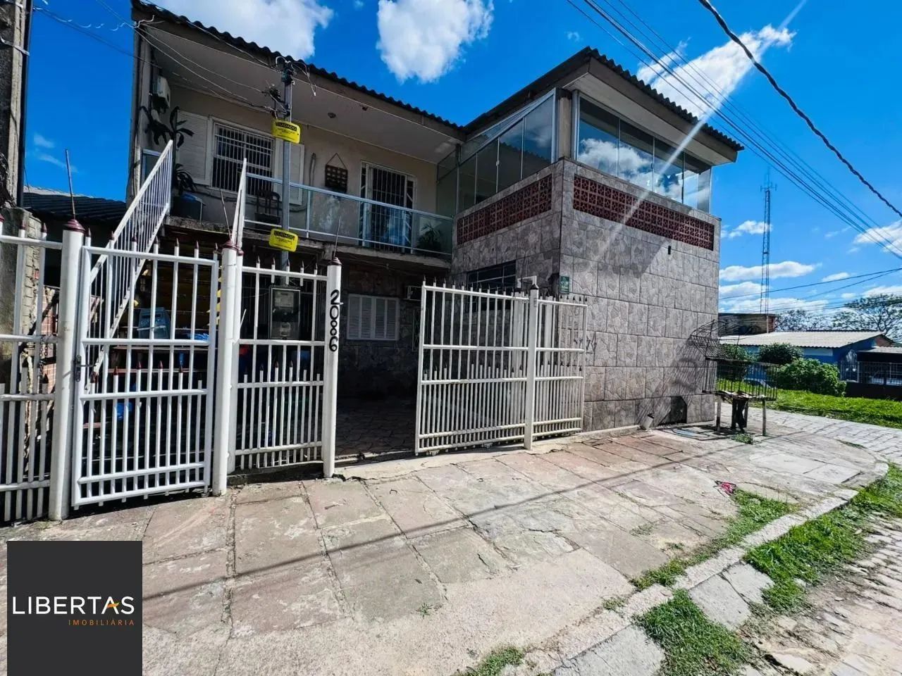 Casa no bairro Restinga - 3 dormitórios