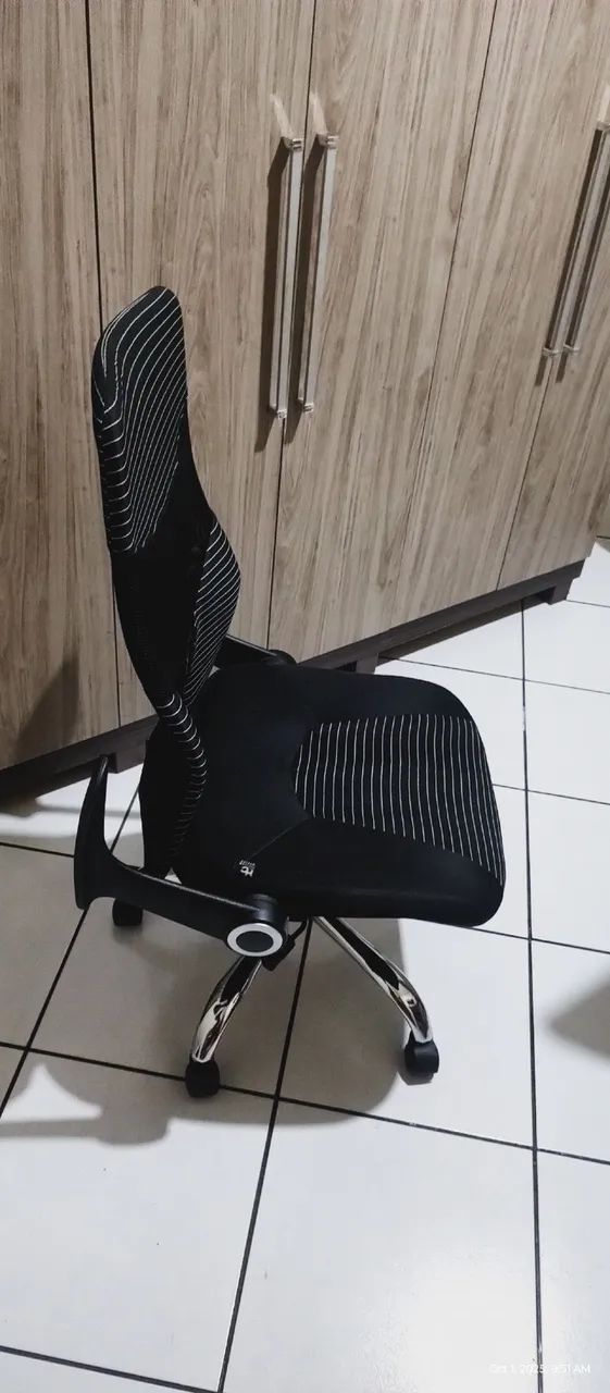 Adjustable-arm office chair.