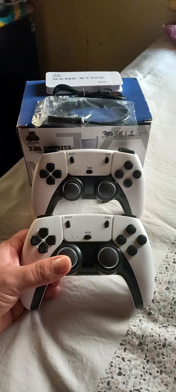 VENDO VÍDEO GAMER STICK M15 PRO  COM 2 CONTROLES  NA CAIXA  COM GARANTIA!!