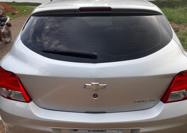 Ônix LT 1.0 2014 Flex prata, dir hidráulica, vidro e trava elétrica, som, ar, 77km - Foto 2
