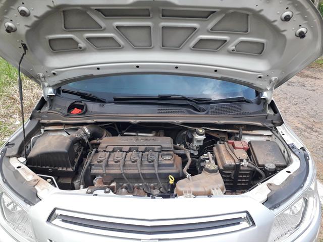 Ônix LT 1.0 2014 Flex prata, dir hidráulica, vidro e trava elétrica, som, ar, 77km - Foto 3