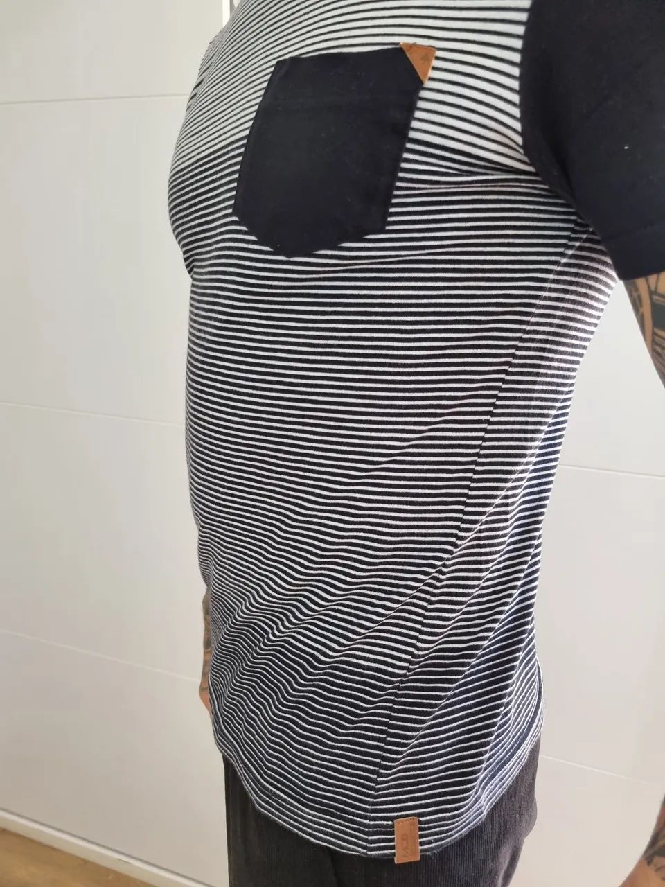 Camiseta MCD listrada com bolso - Foto 3