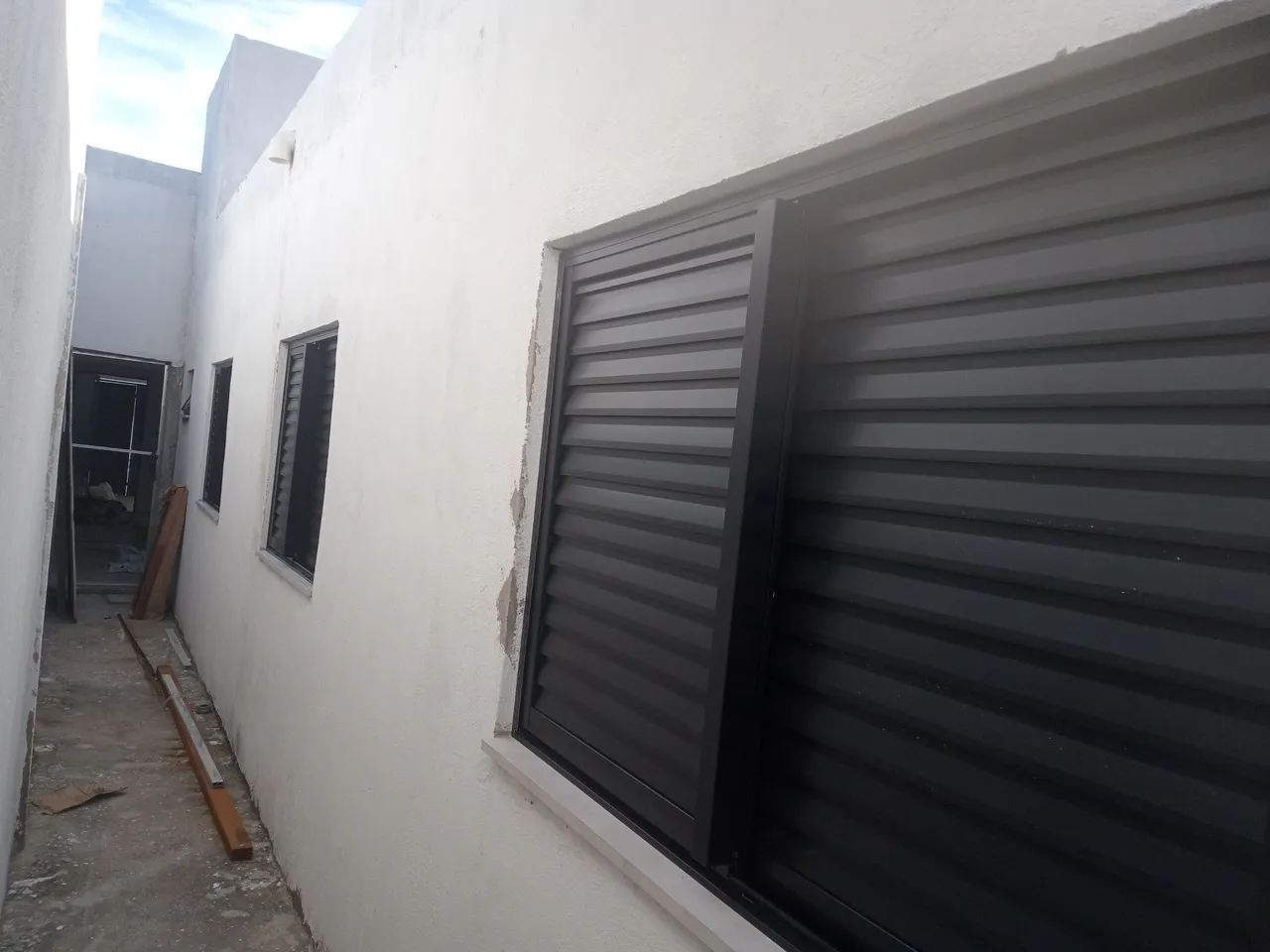 Janelas de alumínio com venezianas