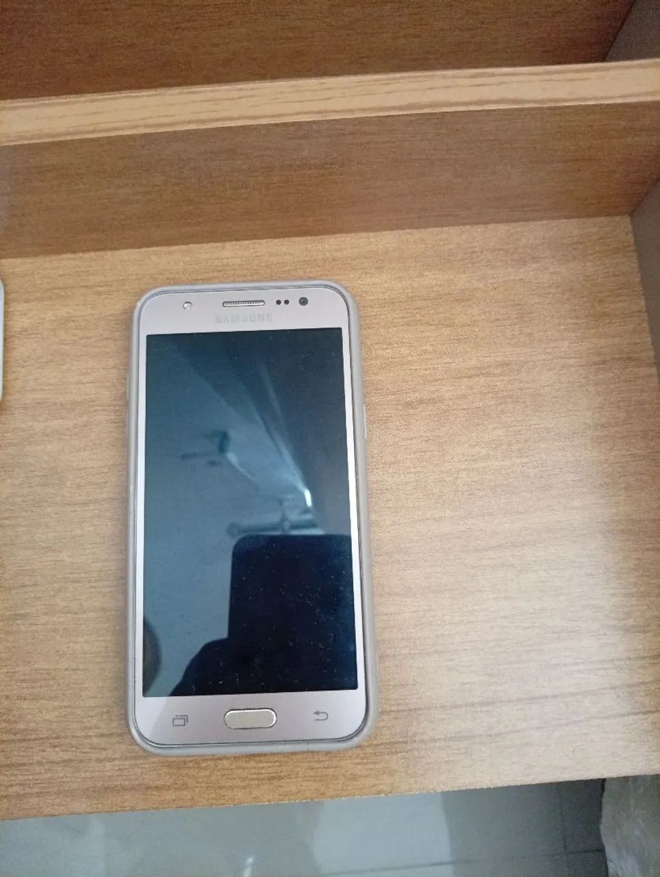Celular j5 16GB dourado 