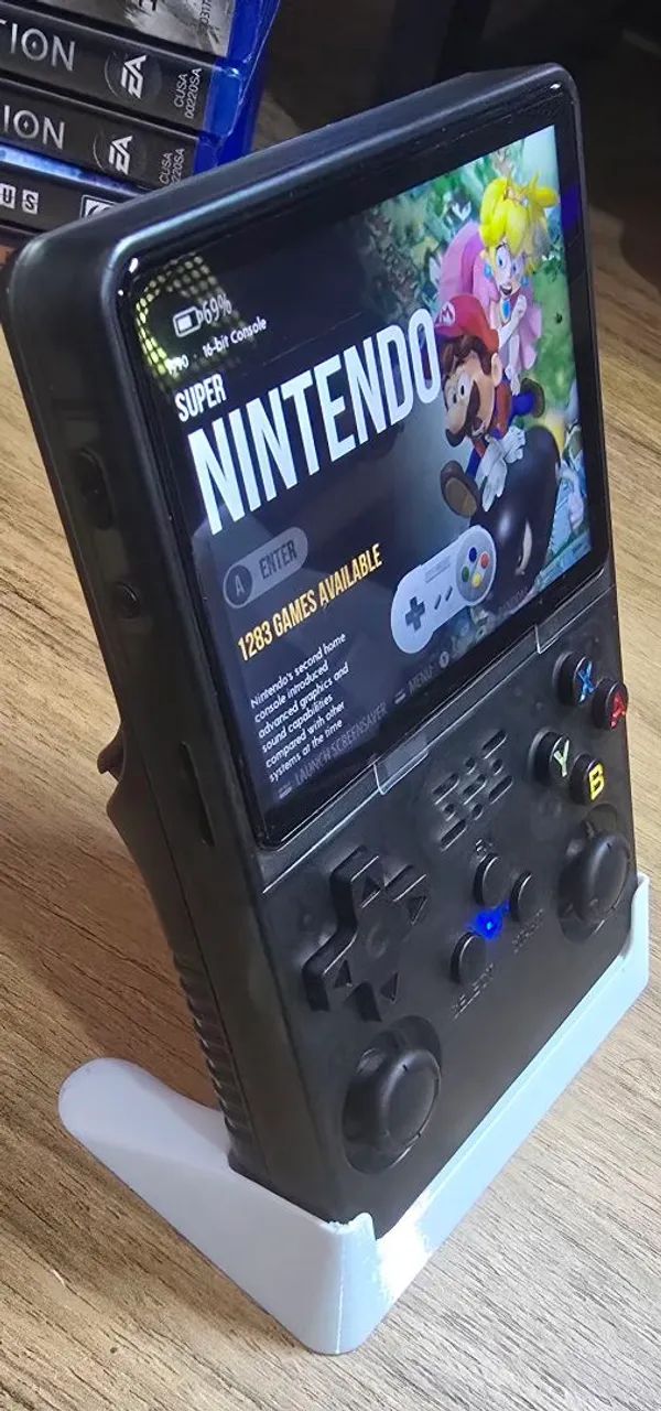 Console portátil R36S com acessórios  - Foto 4