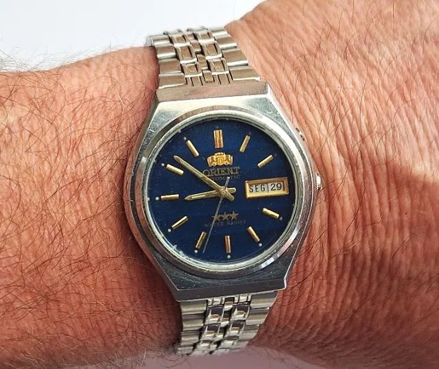 A13= ANTIGO RELOGIO ORIENT FUNCIONANDO VER DETALHES EM DESCRIÇAO