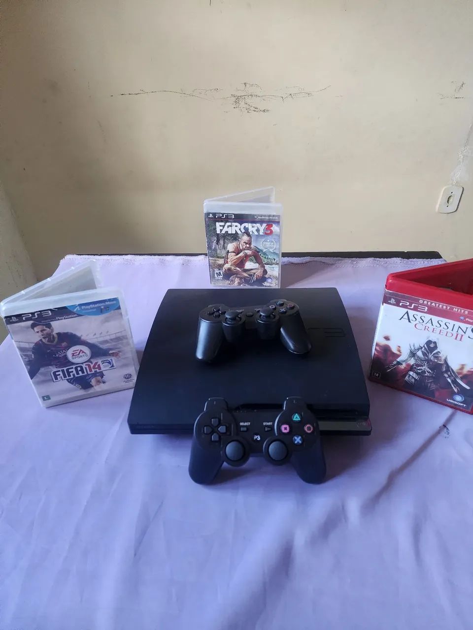 PS3 SLIM + 2 CONTROLES + 3 JOGO - Foto 2