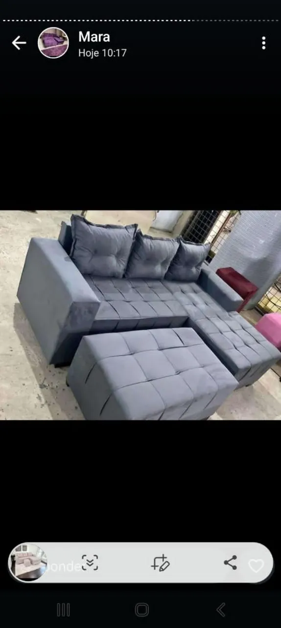 Sofá de canto cinza com puff