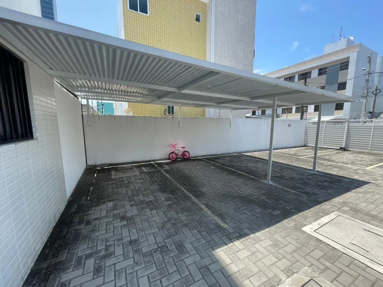 Cobertura garagem prédio 