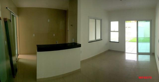 Casa plana na Sapiranga, 3 suítes, 2 vagas, casa nova, Próx Edilson Brasil Soares - Foto 5