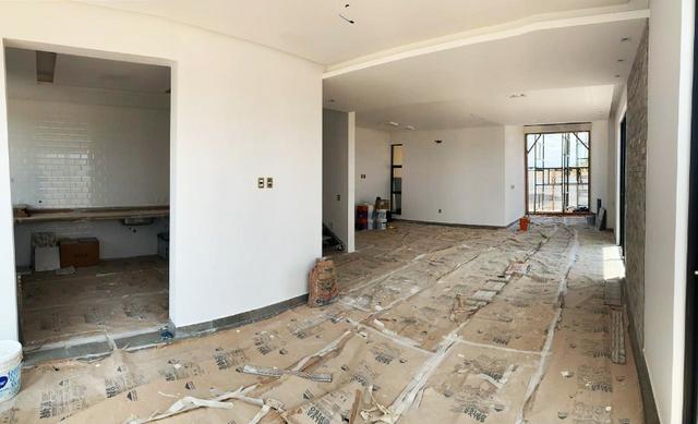 Casa com 4 Suítes/ Área gourmet com piscina