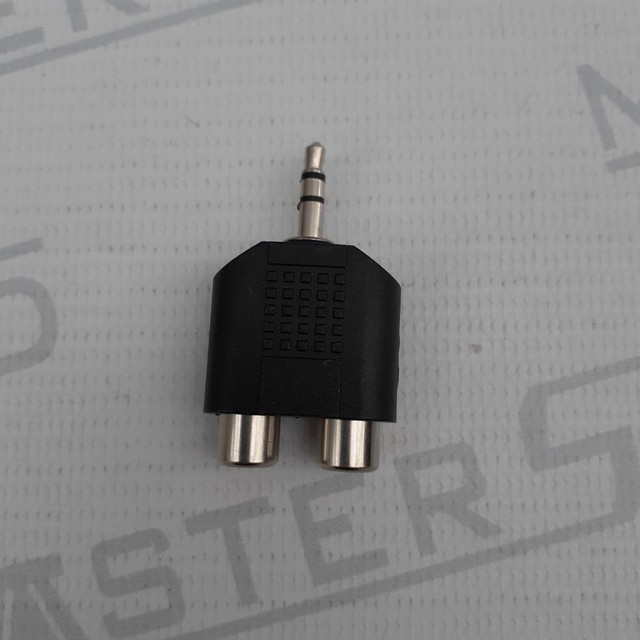 Adaptador. 1P2 macho X 2rca femea. Novo. 