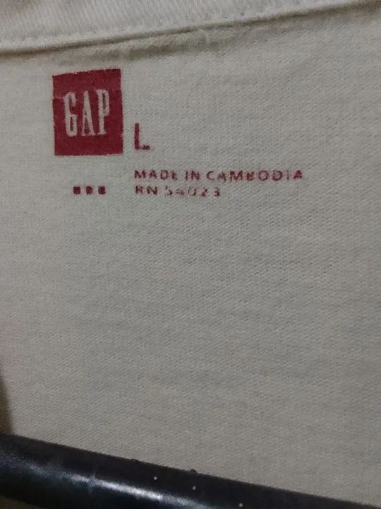 Camiseta Polo listrada Gap Infantil. - Foto 2