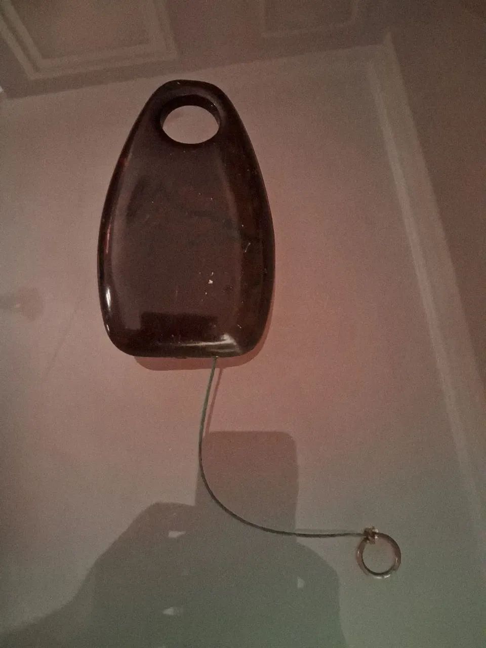 Antigo prumo de linha em baquelite