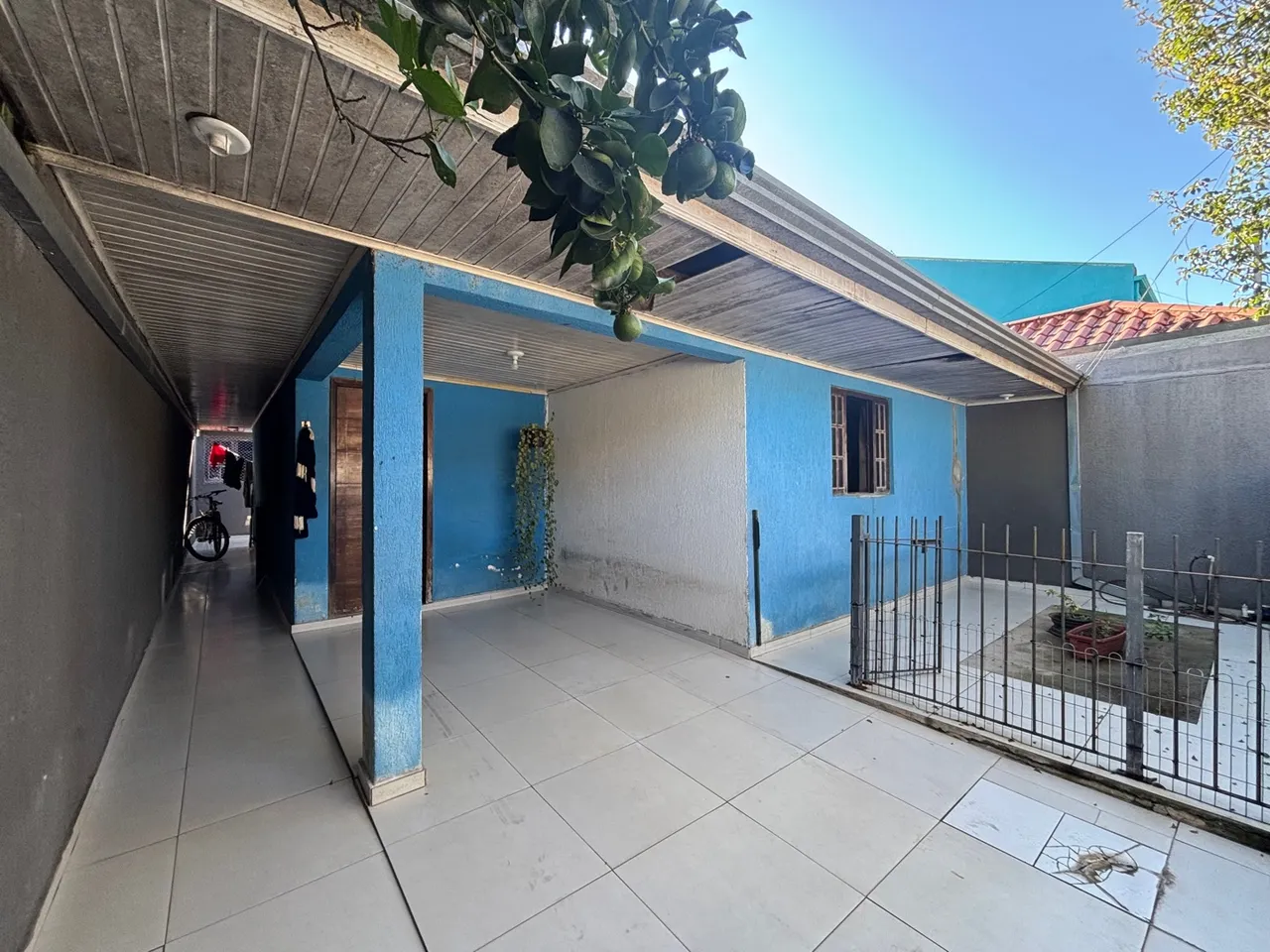 Casa com edícula