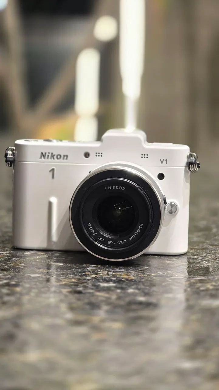 CÂMERA FOTOGRÁFICA NIKON 1 V1 lente 10-30mm BRANCA - Foto 2