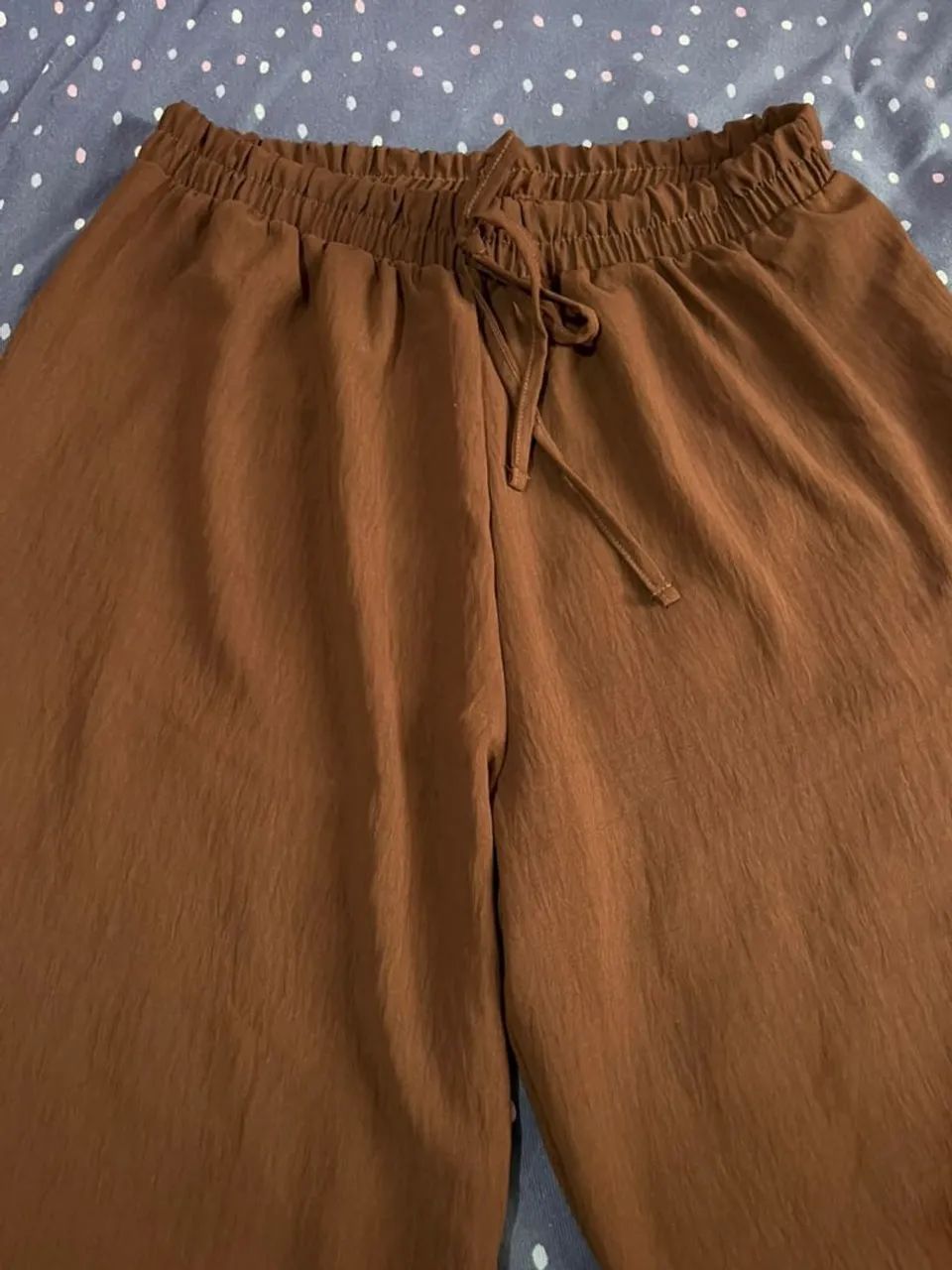 Calça marrom tam G2