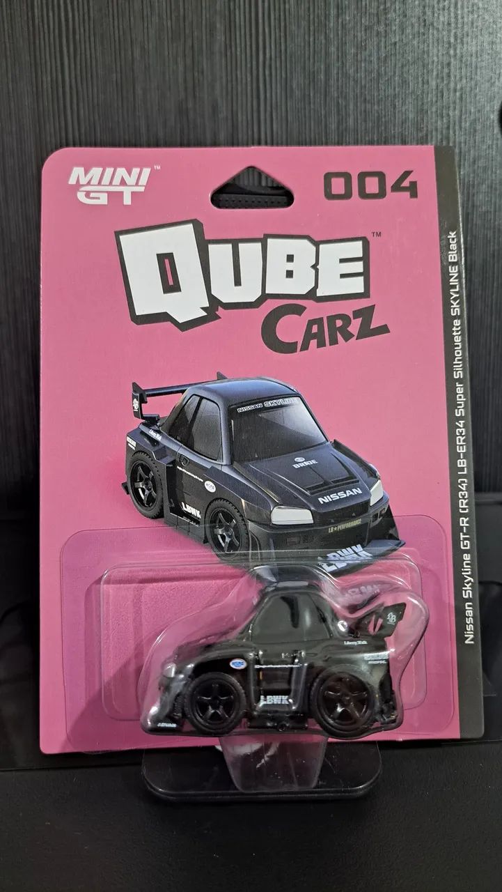 MINI GT Tooned Qube Carz 004 Nissan R34 (Lacrada) - Hobbies e