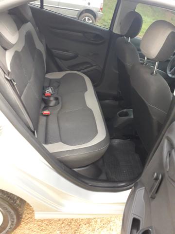 Ônix LT 1.0 2014 Flex prata, dir hidráulica, vidro e trava elétrica, som, ar, 77km - Foto 6