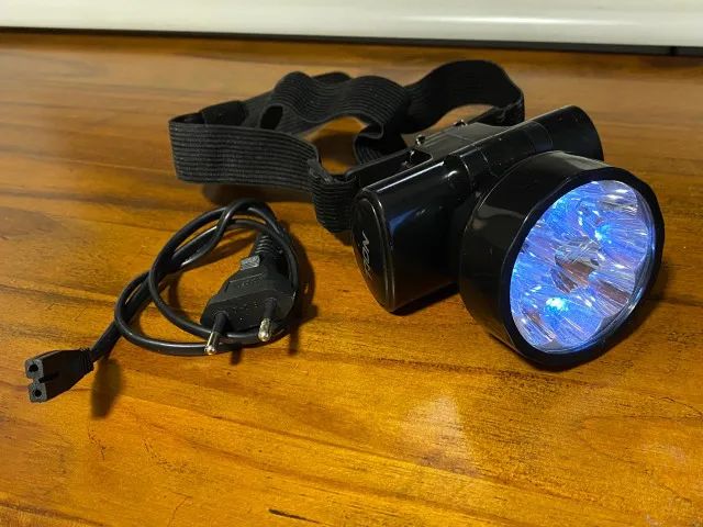 Lanterna para cabeça 9 leds recarregável - marca noll - seminova