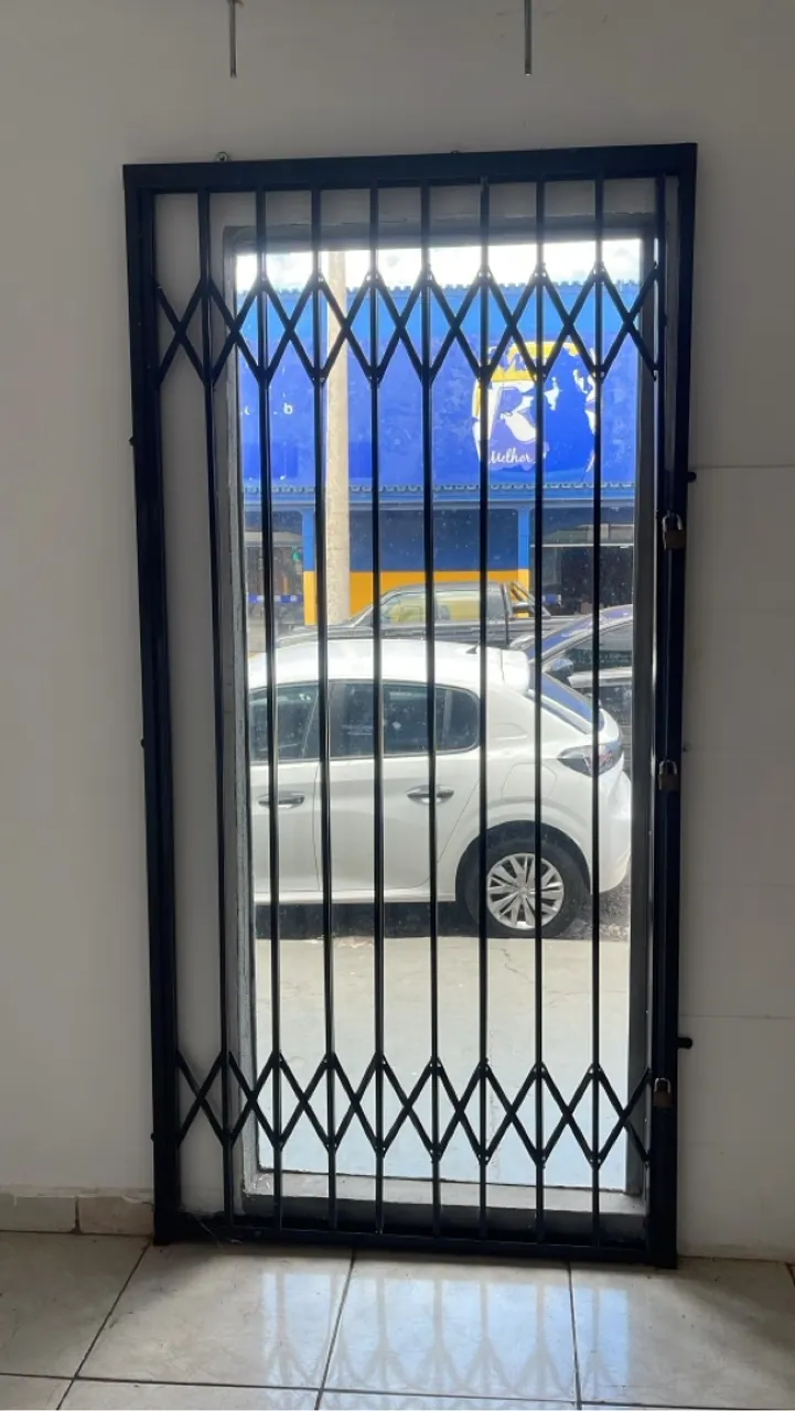 Grade de proteção para porta efeito sanfonado