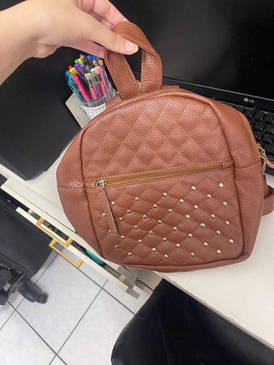 Mochila marrom couro