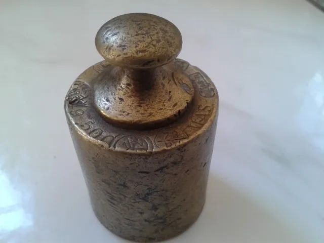 peso de bronze