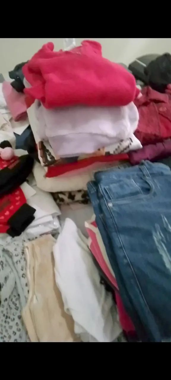 Lote enorme de roupas semi novas e novas - Foto 3