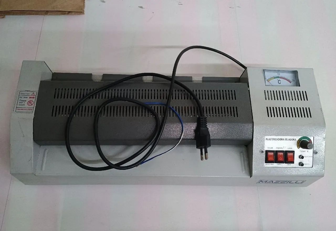 Plastificadora Mazzili a3-a4..saindo fumaça 