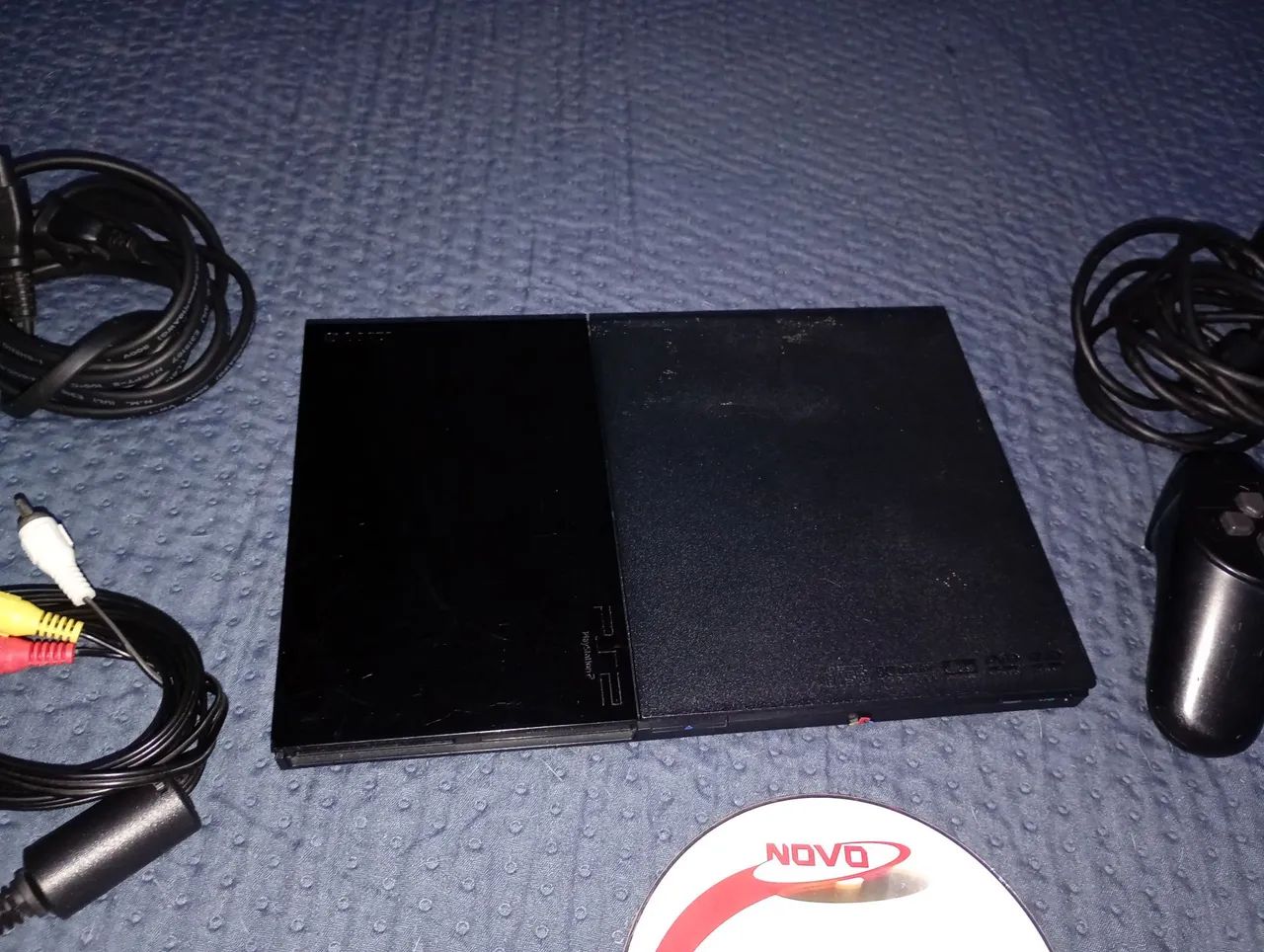 PS2 slim desbloqueado com controle original.