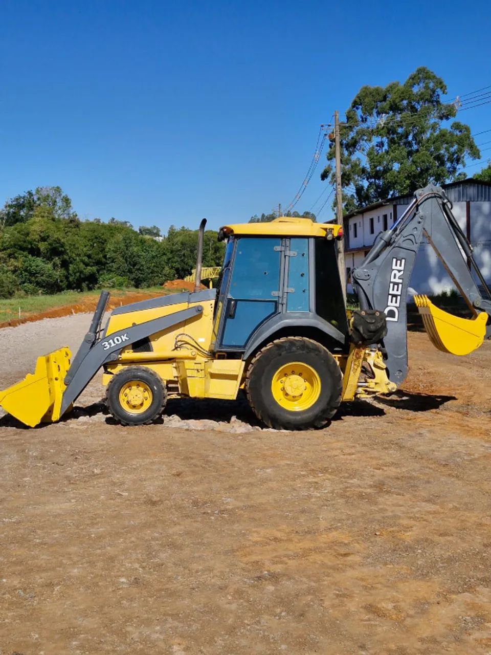Retro Escavadeira John Deere 310k ano 2015 tração 4x4 com 6000 horas  - Foto 3