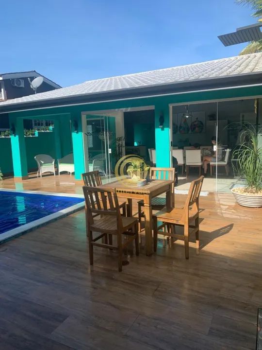 Casa térrea com 4 quartos sendo 2 suítes espaço gourmet com piscina