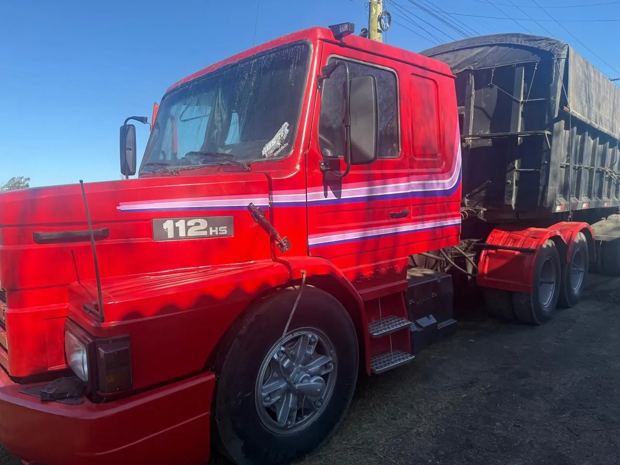 Scania 112h com caçamba