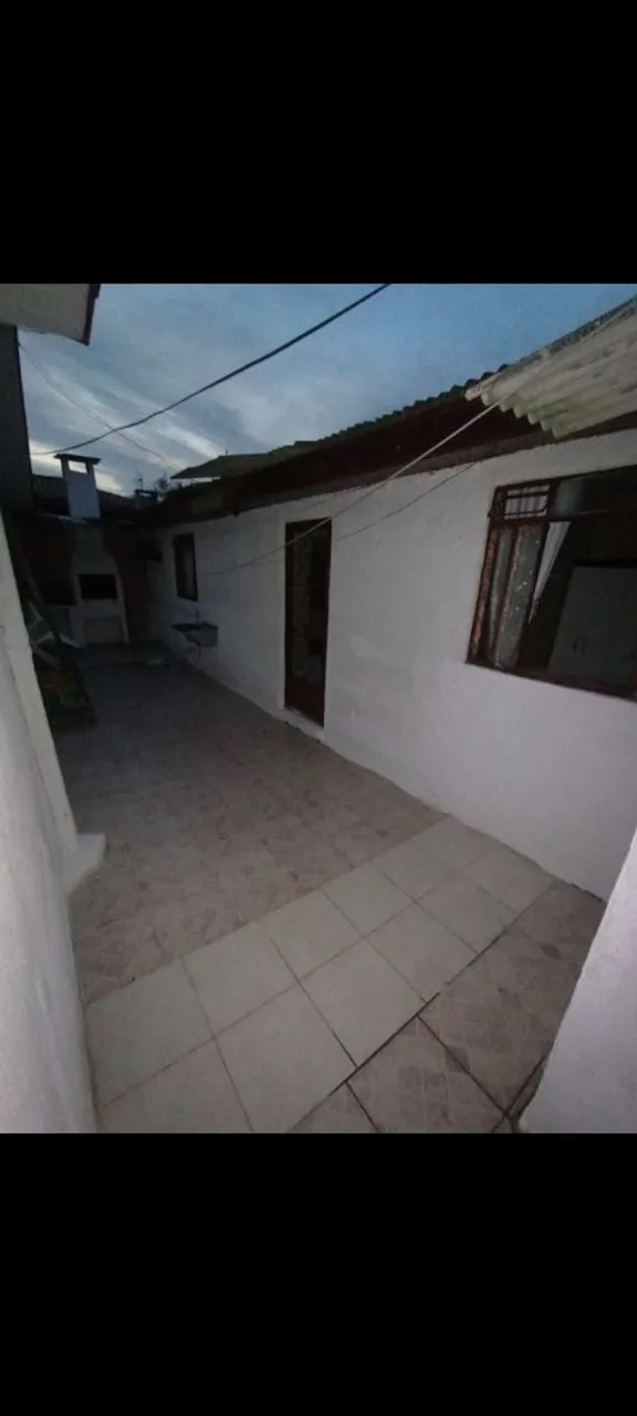 Alugo casa de fundos 4 peças
