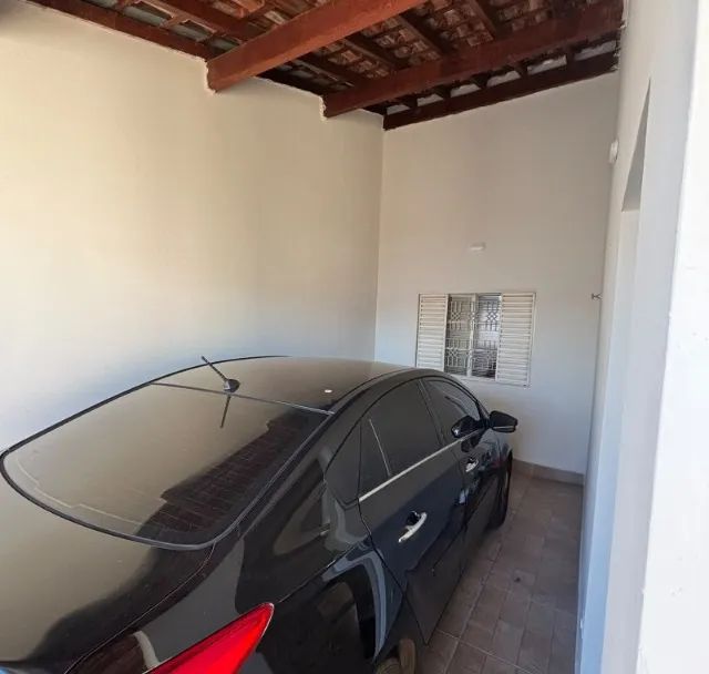 Casa ampla com 3 dormitórios, sala acoplada e garagem coberta - Foto 5