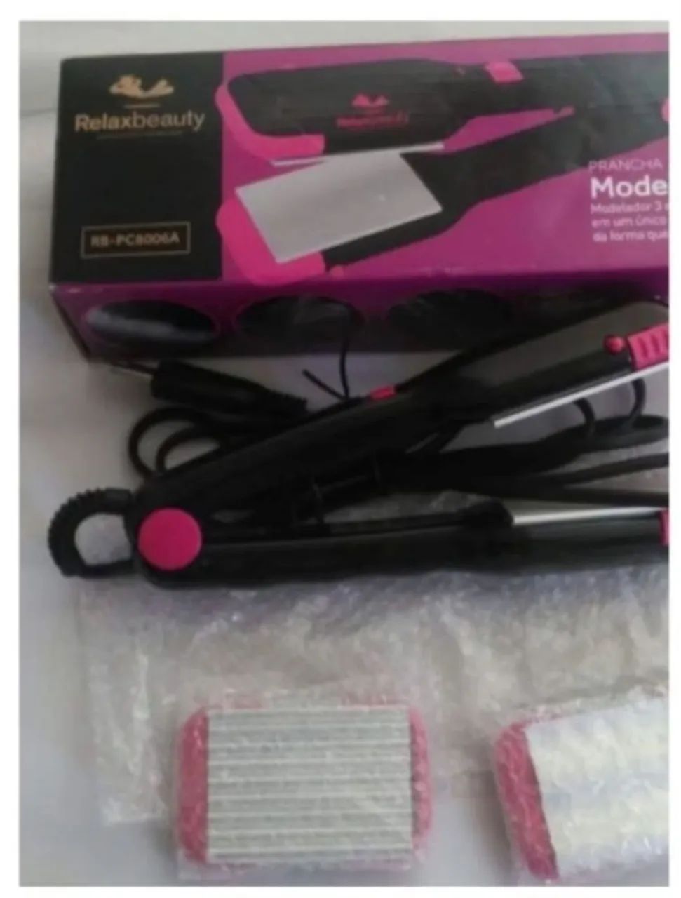 Prancha para cabelo.