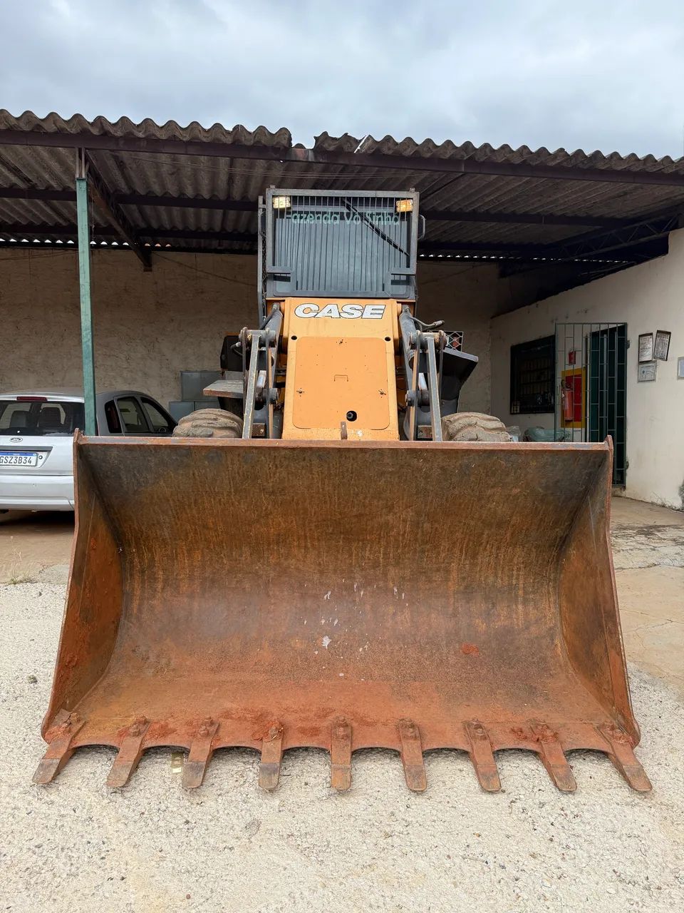 Pá carregadeira 64292889146243125