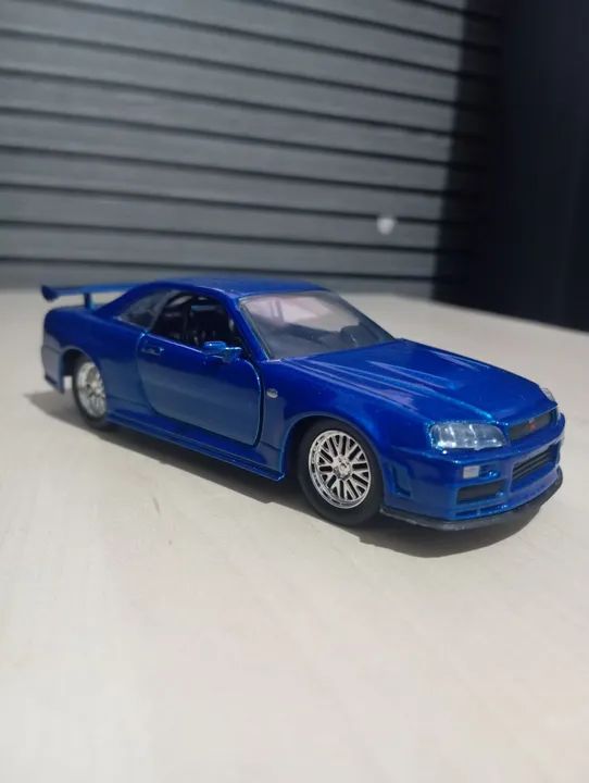 Nissan Skyline GT-R R34 azul - escala 1:24