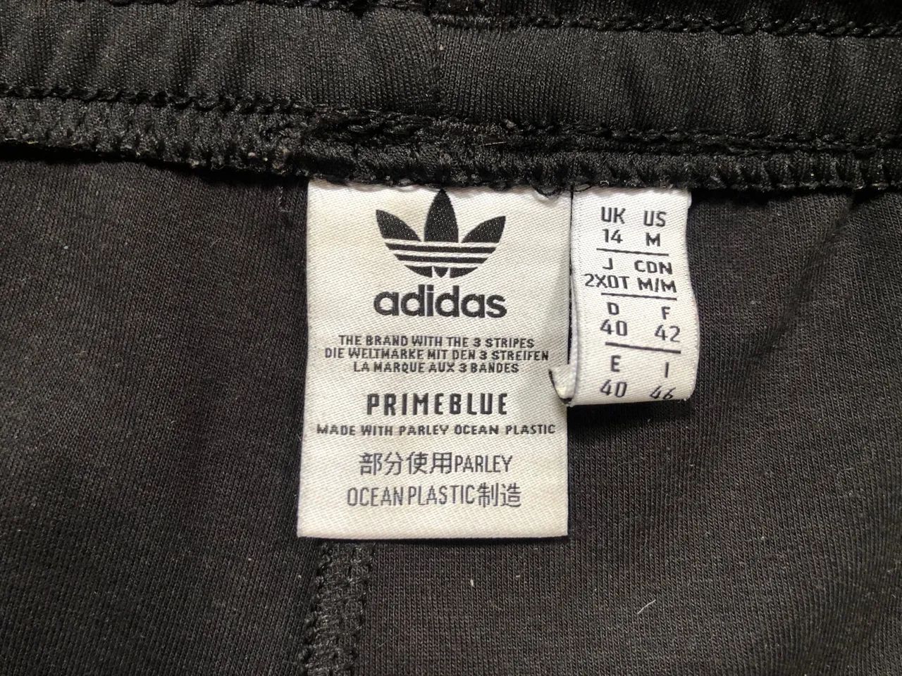 Calça Adidas Original, bolso com zíper - Foto 4