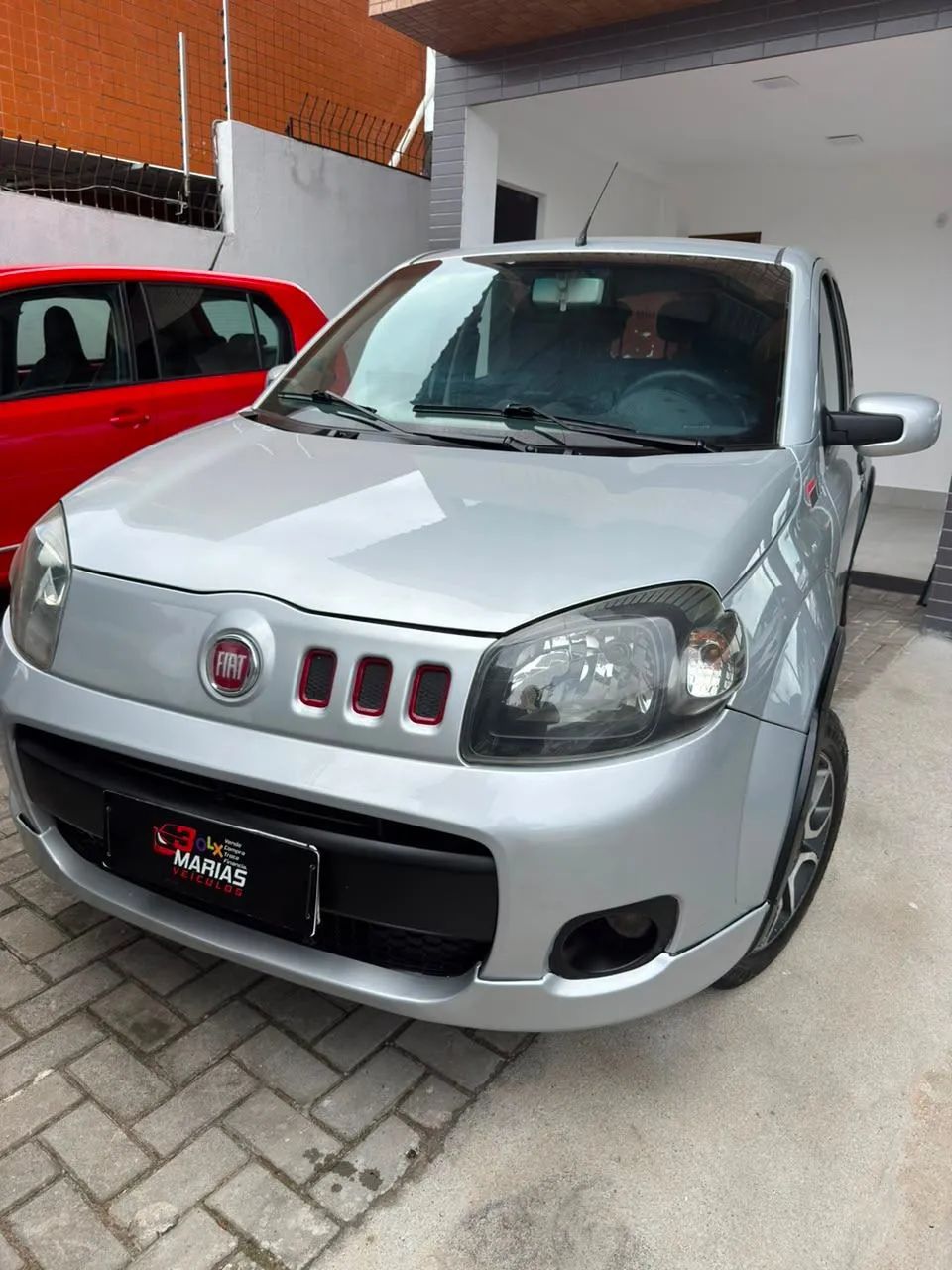 Fiat Uno Sporting 1.4 EVO Fire Flex 8V 4P 2012 - Foto 3