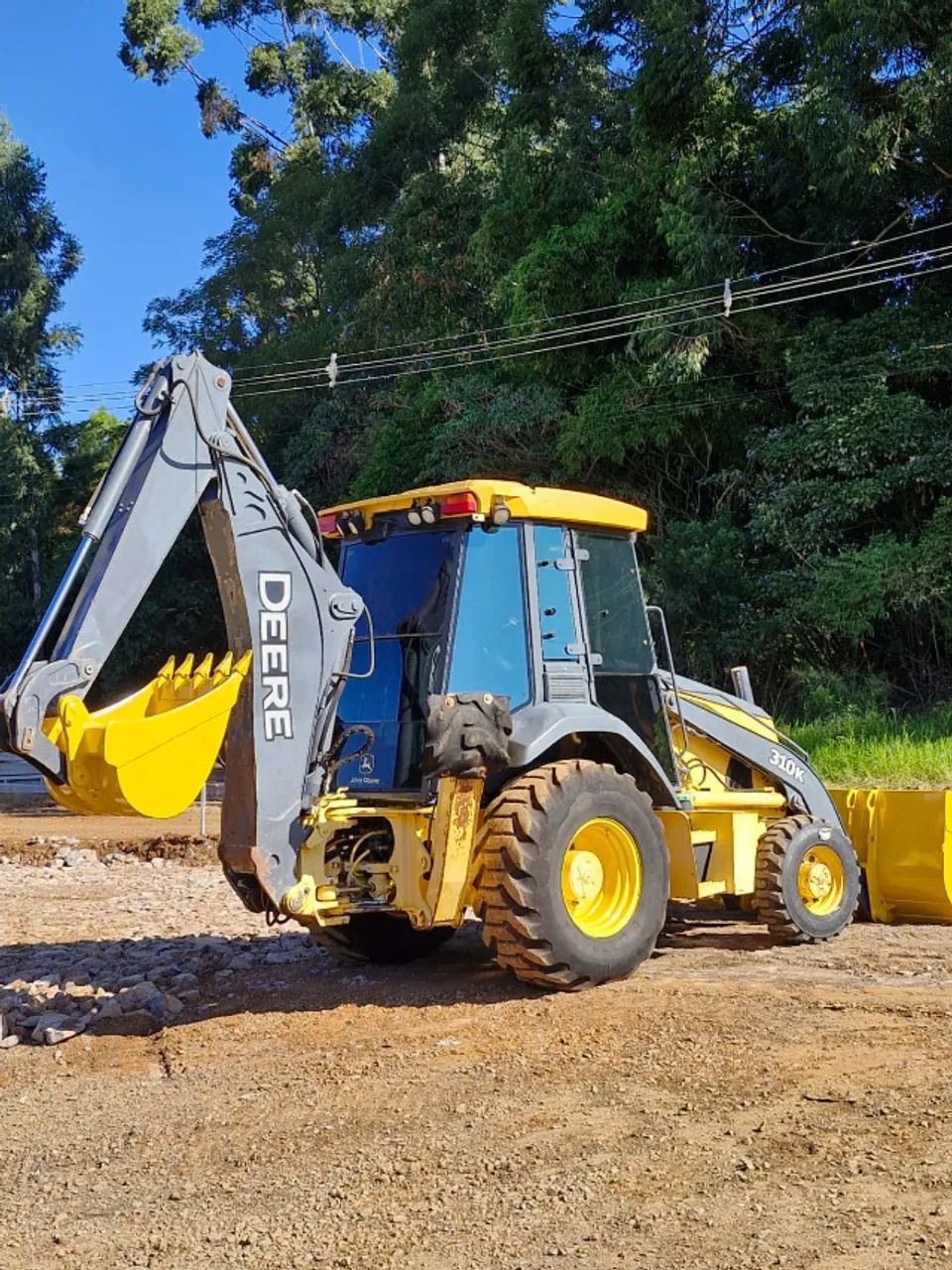 Retro Escavadeira John Deere 310k ano 2015 tração 4x4 com 6000 horas  - Foto 2
