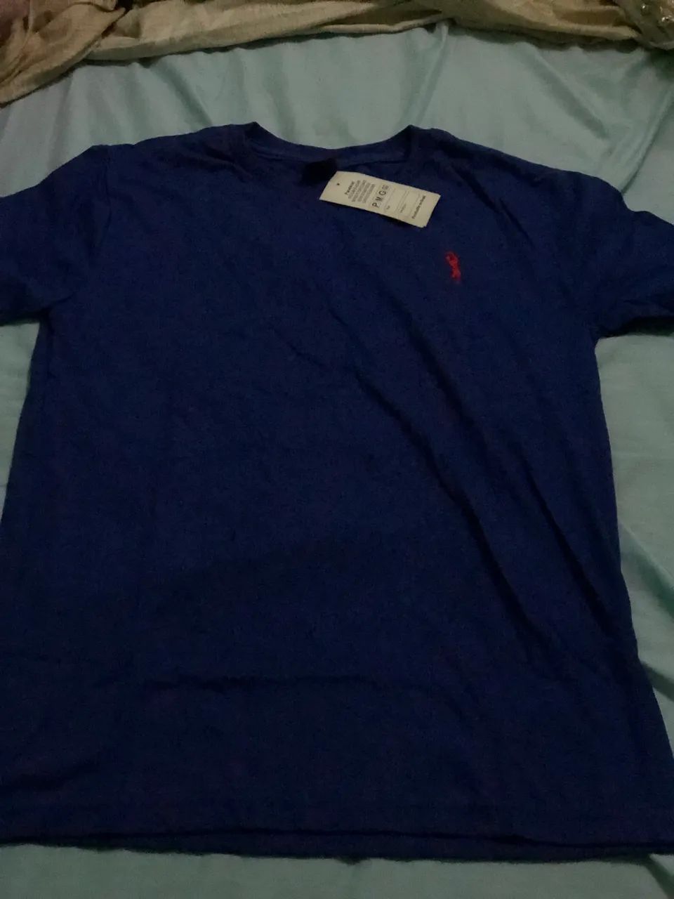 Vendo essas 4 camisa nova nunca usada - Foto 4