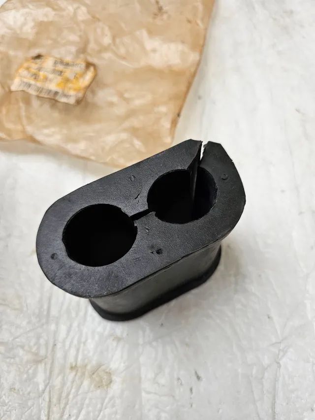 Pa carregadeira caterpillar borracha ilho nova original