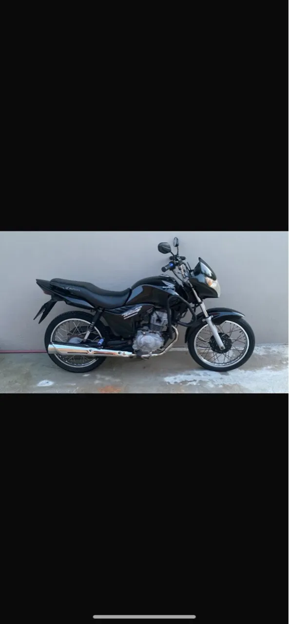 Vende-se moto em dias. No ponto de transferir.