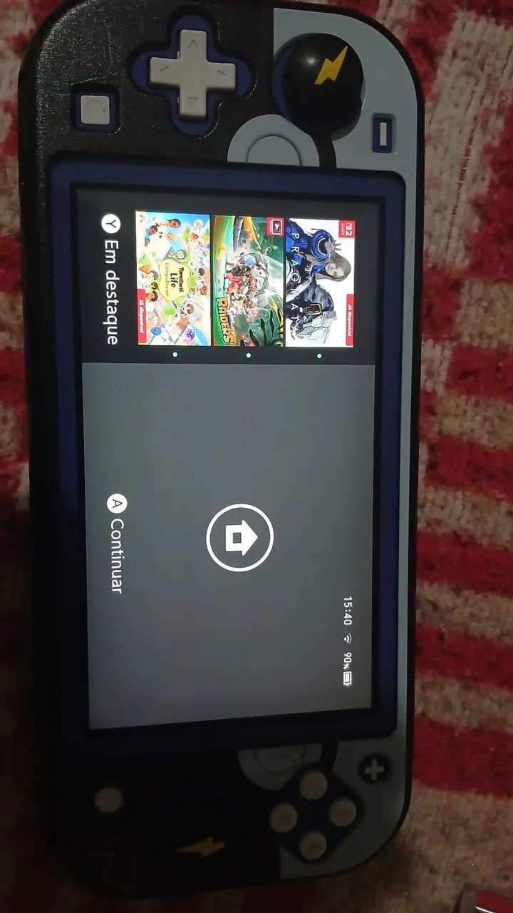 Nintendo switch lite com caixa original e jogos - Foto 2