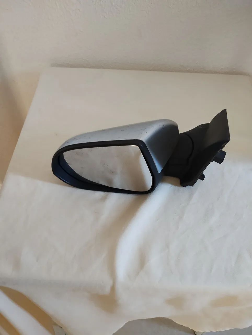 Retrovisor esquerdo onix